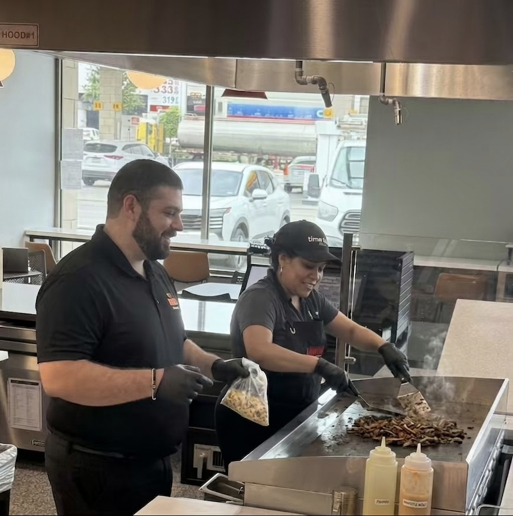 Amjad Bataineh on-site with a kitchen team